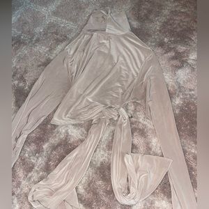 Open back tan long sleeve crop top turtle neck